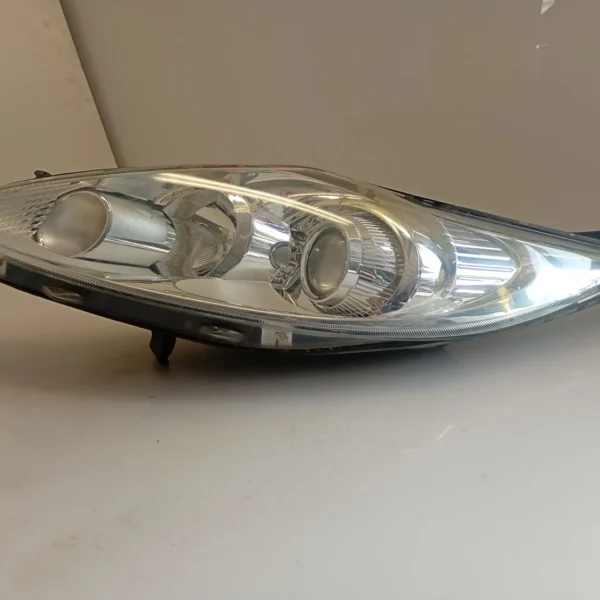 Faro ant. sinistro Ford Fiesta (2008 – 2013) 1.4 50 KW diesel 1740028 F6JD