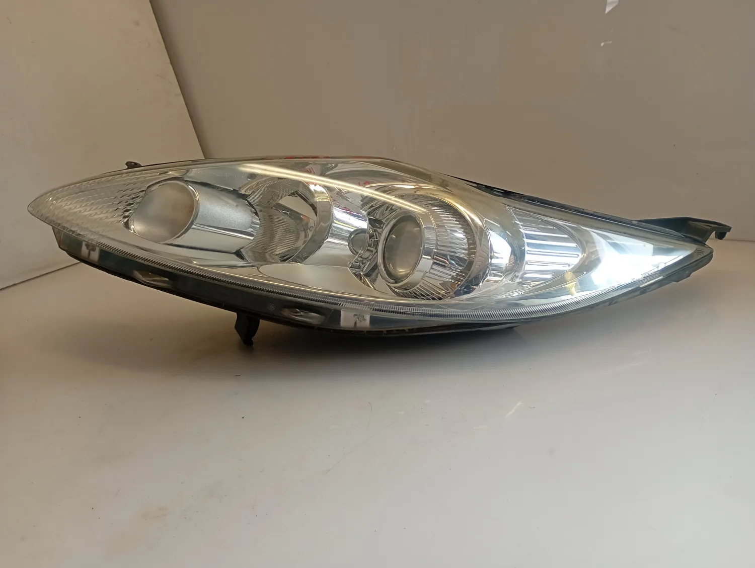 Faro ant. sinistro Ford Fiesta (2008 – 2013) 1.4 50 KW diesel 1740028 F6JD